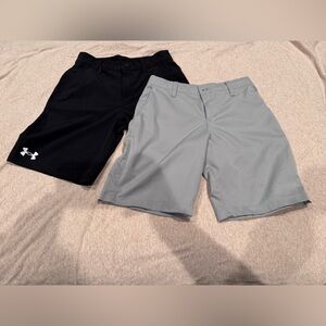 Under Armour Youth size 10 Performance Shorts. 2 pair. Black and silver/Gray